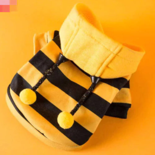 cute bee costume for pets,dog in bee hoodie,cat in bee outfit,fleece hoodie for dogs,cosy hoodie for cats,yellow, black pet hoodie,dog wearing, bumblebee costume,kitten in bee hoodie, soft fleece pet costume,halloween pet outfit,warm, pet hoodie for winter, stylish pet hoodie for cold weather, funny pet costume for dogs, costume for chihuahuas, golden retriever in bee hoodie, pet outfit with antennae,instagram pet costume, snug hoodie for small dogs, french bulldog in bee costume,size-inclusive